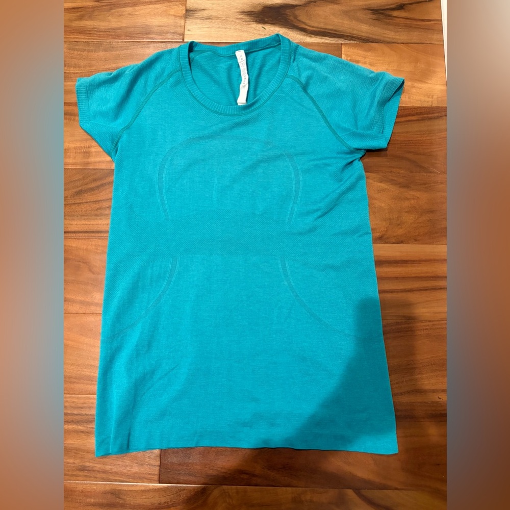 Lululemon size 12 Women's Teal Short Sleeve swiftly tech